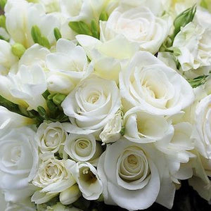 Mudgee florist Mudgee Monkey is a local based florist in the Mudgee Area. Pictured is a generous  bouquet box of classic white and green flowers delivered free