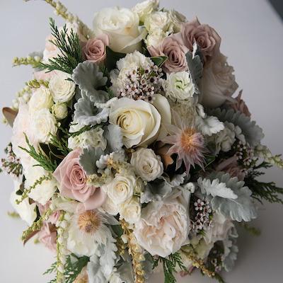 Mudgee Monkey is a local based florist in the Mudgee Area. Pictured is a large bouquet of fresh pastel, local Mudgee flowers.