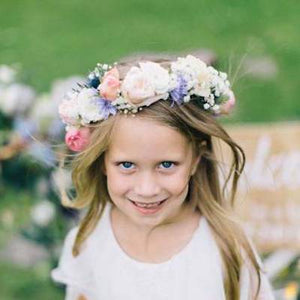 Mudgee florist Mudgee Monkey is a local based florist in the Mudgee Area. Pictured is peach and pink flower childs full flower crown,