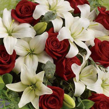 Load image into Gallery viewer, Mudgee florist Mudgee Monkey is a local based florist in the Mudgee Area. Pictured is a generous bouquet of lilies and red roses